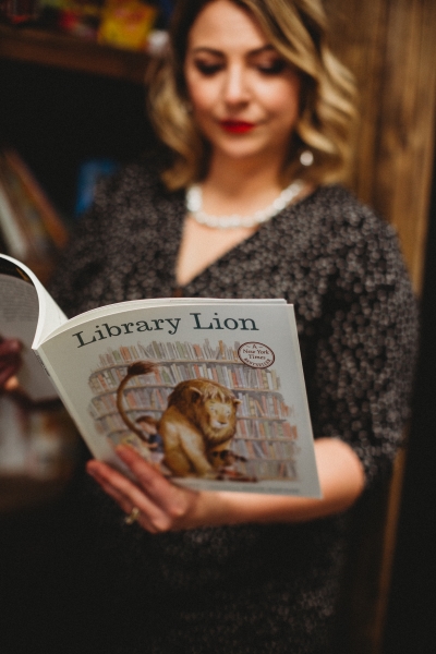 Kara reading the Library Lion